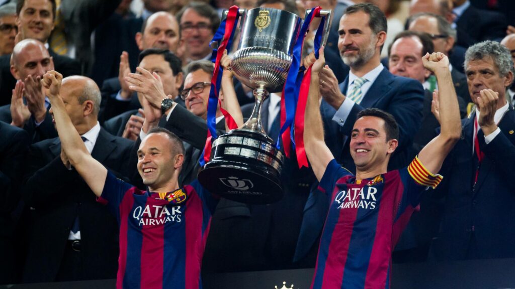 Iniesta y Xavi (Getty)